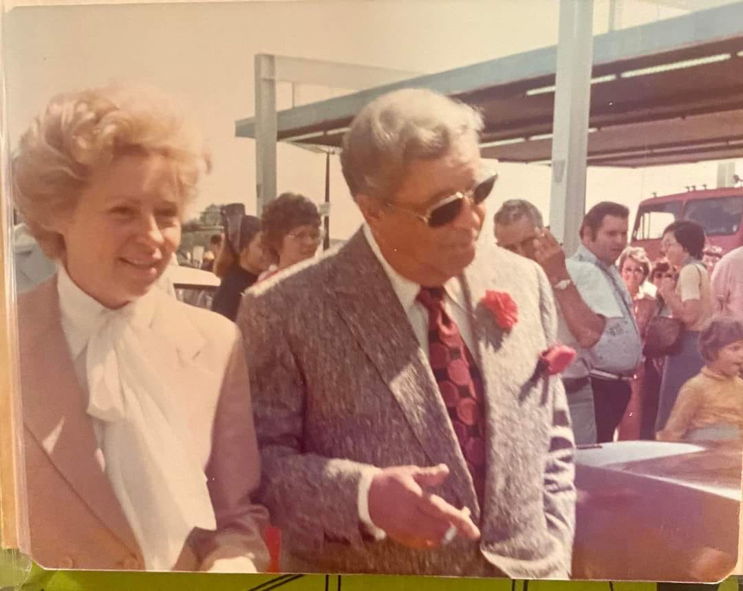 Jackie Gleason, never underdressed, with his signature red carnation